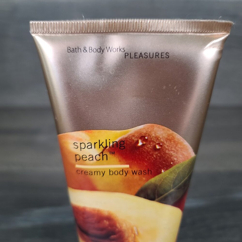 Bath and Body works Lot of 2 Used Pleasures Body Lotion Peach and Exotic Coconut - Picture 10 of 14
